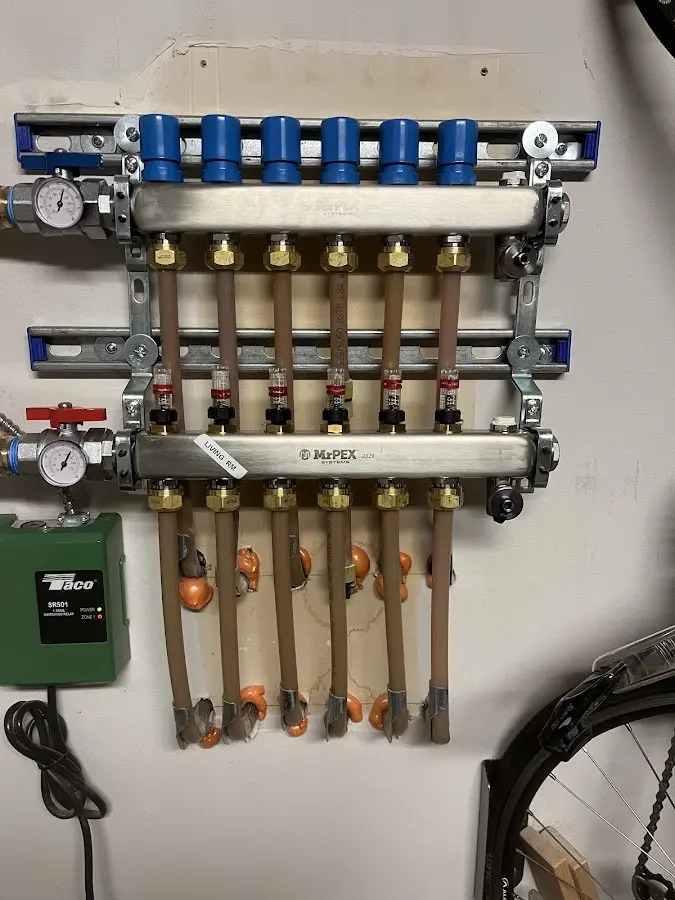 Plumber performing Gas Line Installation at a residential property in Clinton